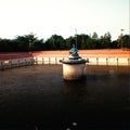Statue of Lord Shiv resting on a pillar in the middle of a Sarvara man made sarovar