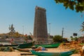 Statue of Lord Shiva in Murudeshwar. Fishing boats. Temple in Karnataka, India