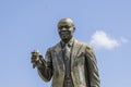 A statue of Louis Armstrong Park with blue sky and clouds at Louis Armstrong Park in New Orleans Louisiana Royalty Free Stock Photo