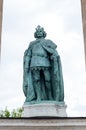A statue of Louis I of Hungary in the left colonnade of the Millennium Monument in Heroes Square, Budapest