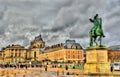 Statue of Louis XIV in front of the Palace of Versailles Royalty Free Stock Photo
