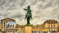 Statue of Louis XIV in front of the Palace of Versailles