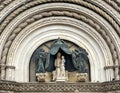 Statue of the Madonna and Child in the lunette of the facade of the monumental Orvieto Cathedral in Orvieto, Italy. Royalty Free Stock Photo