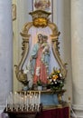 Statue of the Madonna holding Jesus in the Church of Santa Maria Maddalena in Castiglione del Lago, Italy.