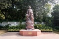 The statue of Mahatma Gandhi with children in bronze standing in the courtyard Royalty Free Stock Photo