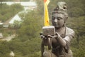 Statue making offering to the Tian Tan Buddha, Hong Kong