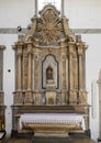 Statue of a male Saint in a side altar in the Sanctuary of Our Lady of Nazare, Portugal.