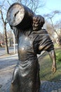 Statue of a man with a barrel