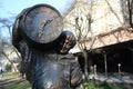 Statue of a man with a barrel