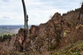 Statue of man on bottom of Eagle Arch surrounded by rocks