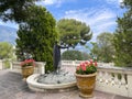 Statue of a man feeding birds in Monaco Ville, Monaco