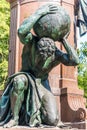 Statue a man holding a ball of historic Bismarck Memorial in the Tiergarten in Berlin, Germany. Royalty Free Stock Photo