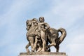 Statue Of Man And Horse on at the bridge pier on the bank of Seine river, in the downtown of Paris, France