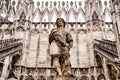 Statue of a man in knightly uniform in the Duomo. Italy, Milan