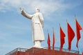 Statue of Mao zedong with red flags Royalty Free Stock Photo