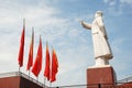 Statue of Mao zedong with red flags Royalty Free Stock Photo