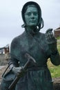 Statue of Mary Anning located in Lyme Regis, Dorset, UK