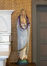 Statue of Mary, part of the altar of Saint Benedict`s Painted Church on the Big Island, Hawaii. Royalty Free Stock Photo