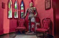 Statue of medieval knight in full armor stand in an cafe corner