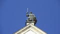 Statue of a medieval knight on the roof of Neuschwanstein Castle in Bavaria, Germany.