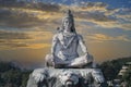 Statue of meditating Hindu god Shiva on the Ganges River at Rishikesh village in India Royalty Free Stock Photo