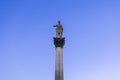 Statue of Minerva on the Colonna di Minerva and Galleria degli Antichi against the blue sky. Sabbioneta, Lombardy, Italy Royalty Free Stock Photo