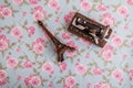 Statue Model of Eiffel Tower and Sewing Machine on Floral Background