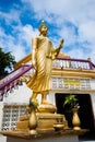 Statue of monk walking