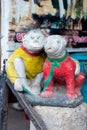 Statue of Monkey and Bulldog is on the street in Bangkok, Thailand. There are many sayings that mean monkey and dog belong togethe Royalty Free Stock Photo