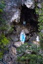Statue of Mother Mary in a rocky cave. Saint. Capri Island, Italy Royalty Free Stock Photo