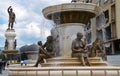 Statue of mother & son and statue of Alexander the Great in background, in center of Skopje (downtown), Macedonia (