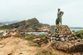 Statue Of Mr. Lin Tien-Chen In Yehliu Geopark, A Cape On The North Coast Of Taiwan. A Landscape Of Honeycomb And Mushroom Rocks.