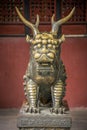 Statue of mystical Chinese guardian lion in Wenshu Temple. Royalty Free Stock Photo