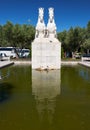 Statue of mythical hippocampus racing over the pond on the Empire Square. Lisbon. Portugal