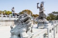 Statue of the mythological animal in front of Golden statue of bodhisattva guanyin Mount Luojia, Zhoushan, Zhejiang, the place