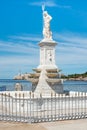 Statue of Neptune and the castle of El Morro in Havana Royalty Free Stock Photo