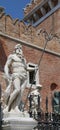 Statue of Neptune with the trident near the building called Arse