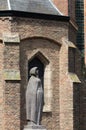 Statue next to Oude Kerk Delft