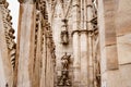 Statue of a noble man in rich clothes on the facade of the Duomo. Italy, Milan