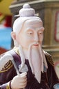 Statue of old Chinese man. Royalty Free Stock Photo