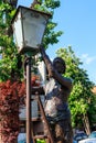 Statue of Old Lamplighter, igniting lights on streets of Tbilisi, Georgia Royalty Free Stock Photo