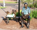 Statue of An Old Man Reading A Book To A Young Child Royalty Free Stock Photo