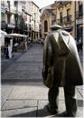 Statue of an old poet Adares in Salamanca Old Town