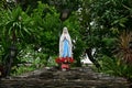 Statue of Our lady of grace virgin Mary view with natural background in the rock cave at Thailand