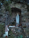 Statue of Our Lady and St Bernadette in grotto