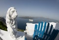 Statue over harbor santorini Royalty Free Stock Photo