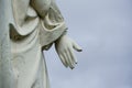 Statue painted hand from a saint on historic cemetery