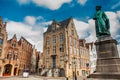 Statue of the painter Jan Van Eyck at the historical town of Bruges