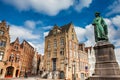 Statue of the painter Jan Van Eyck at the historical town of Bruges