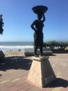 Statue of a Palenquera on the coast - the Symbol of Cartagena Colombia South America